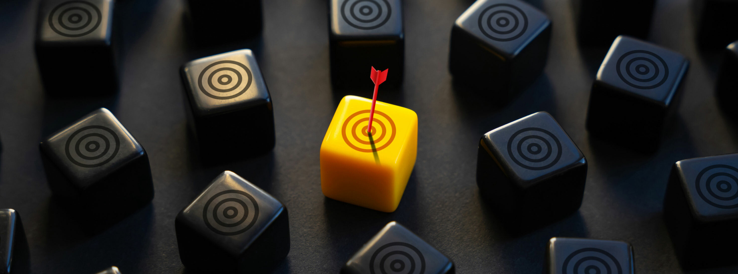 Target buyer persona. Yellow cube with a bullseye and arrow